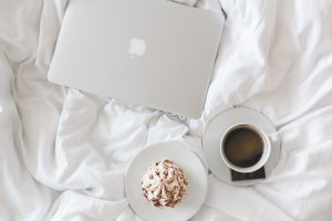 kaboompics-com_top-view-of-apple-macbook-coffee-cake