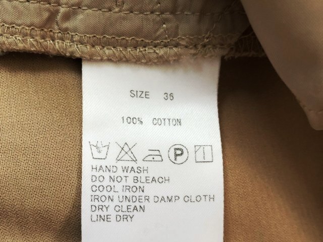 以前の洗濯表示が付いた衣類の例。現在の製品は、その製品の記号と案内を確認してください。